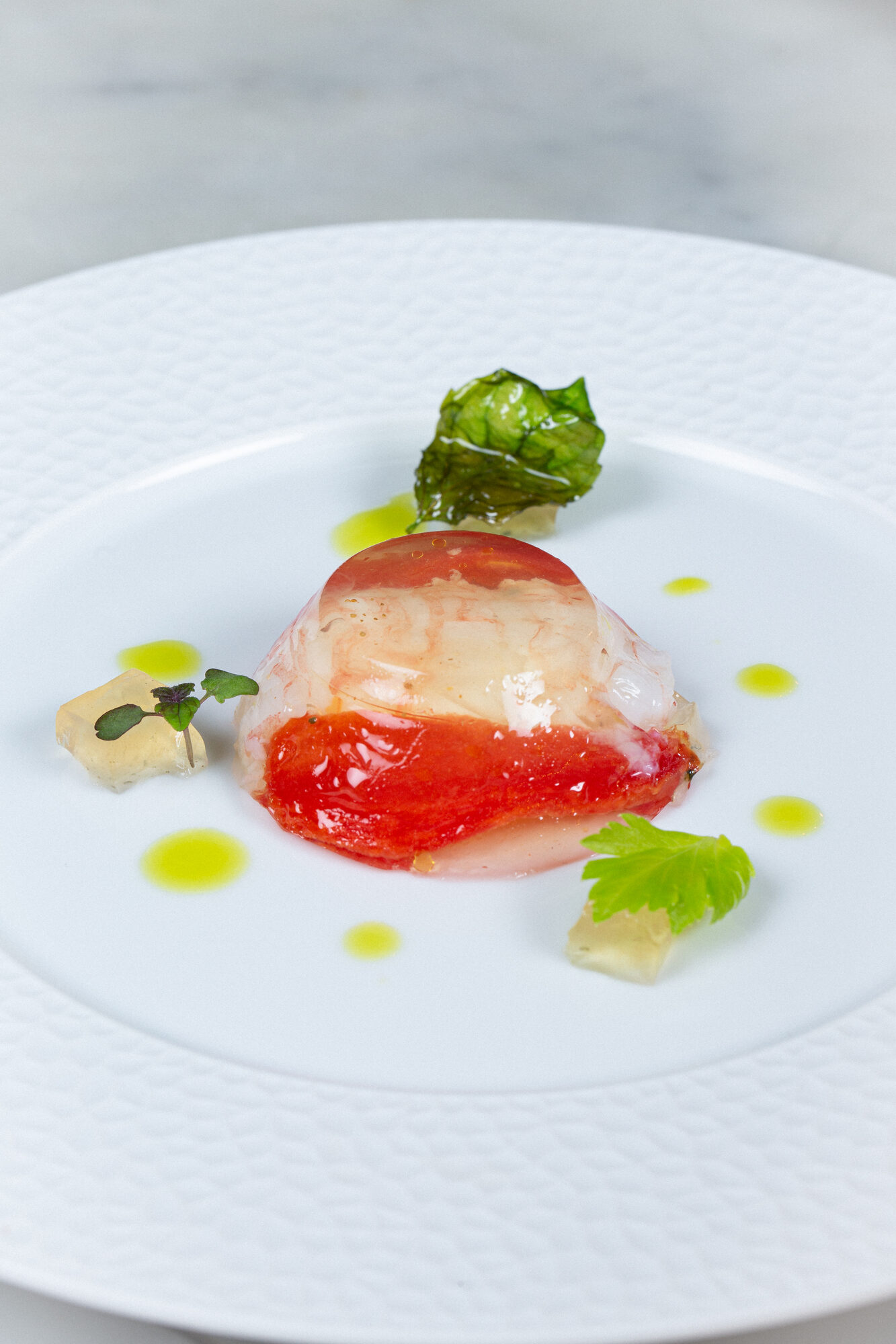 A lobster dish, plated and finished.