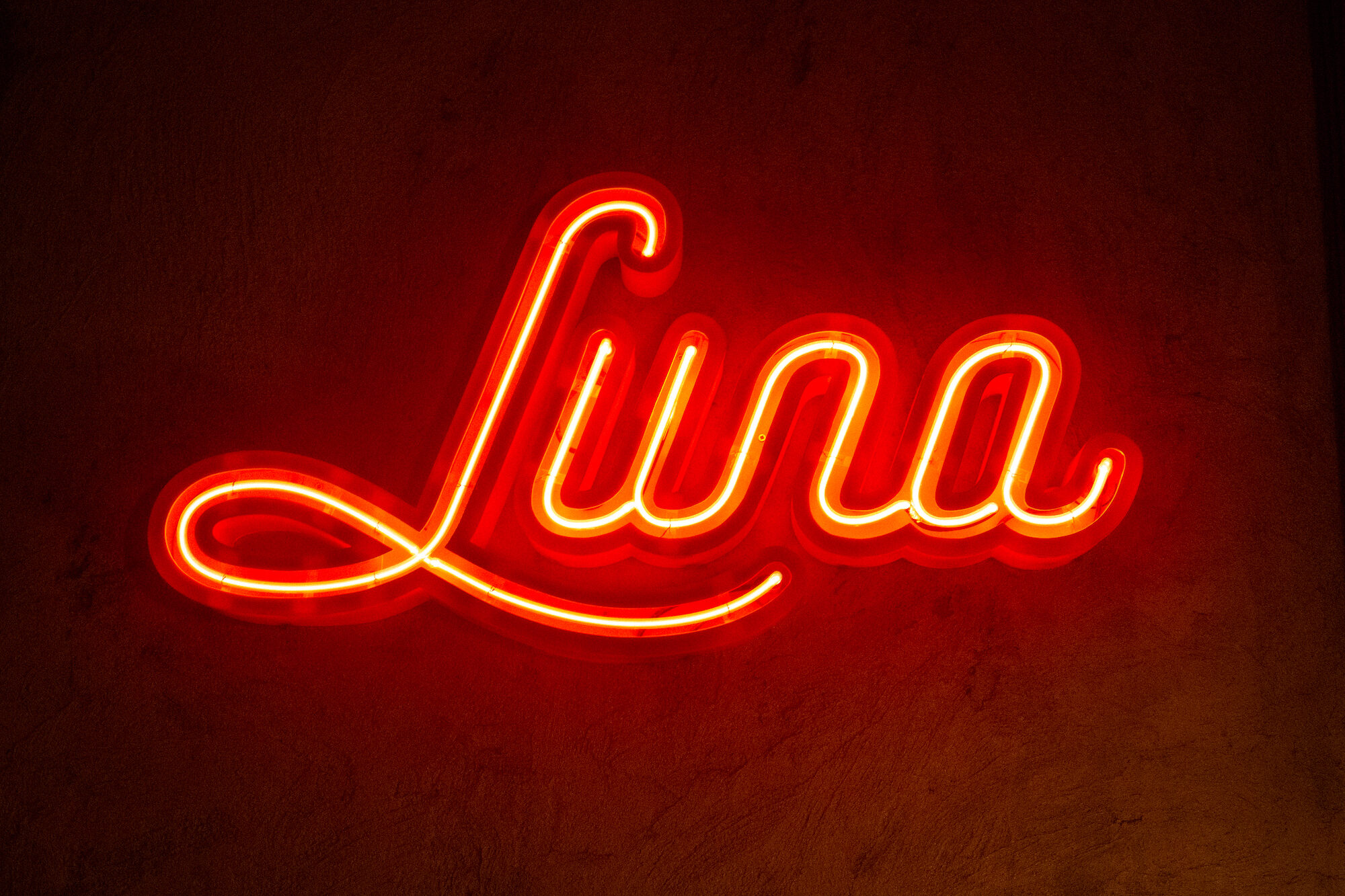 A neon sign in the interior — atmosphere detail.